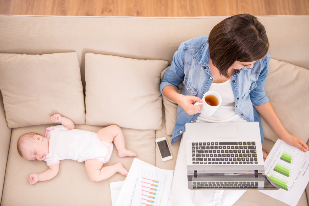 A mom going back to college searching for scholarships for mothers.
