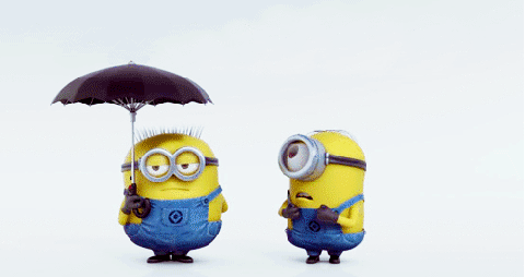 One Minion holding an umbrella that unfolds into a second umbrella for another minion