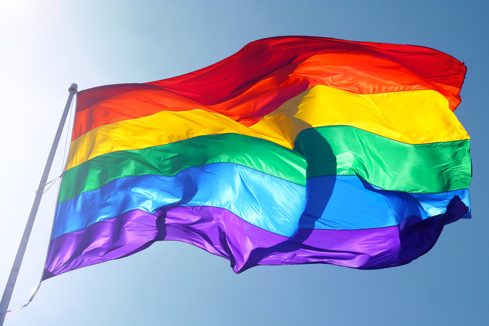 LGBT flag waving in the sky