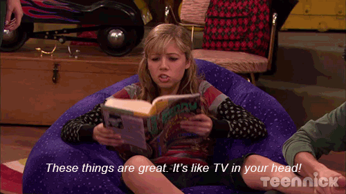 A girl reading a book says "These things are great. It's like TV in your head!"